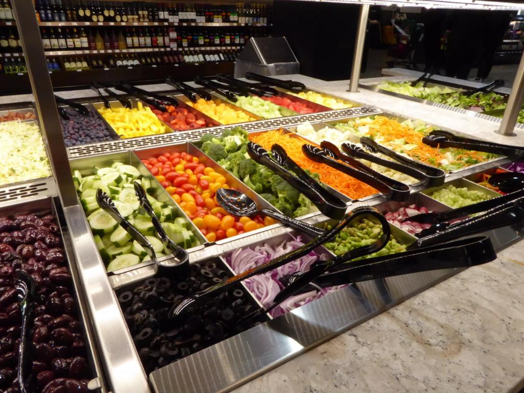 Technician repairing commercial refrigeration equipment